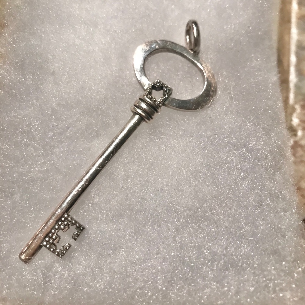 Silver key pendant